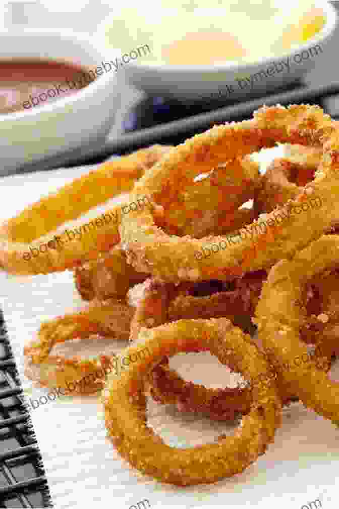 A Plate Of Crispy Golden Brown Onion Rings Stacked High, Garnished With A Sprinkling Of Fresh Parsley. Grill Bar Recipes Copycat Cookbook (Copycat Cookbooks)