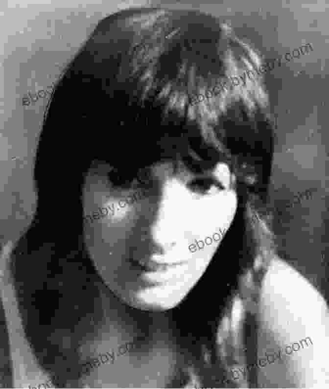 A Young Karen Silkwood, Smiling And Wearing A Blue Shirt. The Killing Of Karen Silkwood: The Story Behind The Kerr McGee Plutonium Case