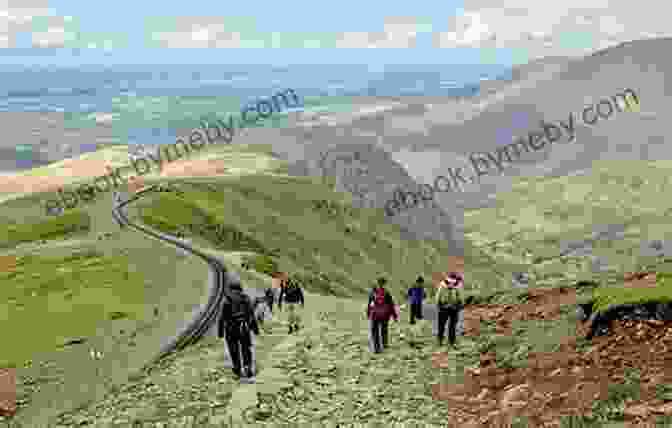 Hikers Navigate A Challenging Trail In Snowdonia, Surrounded By Breathtaking Mountain Scenery The Rough Guide To Wales (Travel Guide EBook) (Rough Guides)