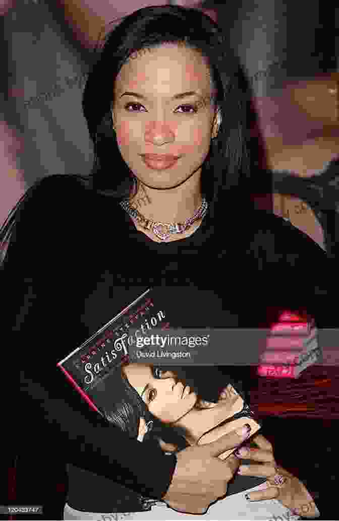 Karrine Steffans Signing Copies Of Her Book, Surrounded By Eager Fans, Her Face Beaming With Pride And Gratitude. The Vixen Diaries Karrine Steffans